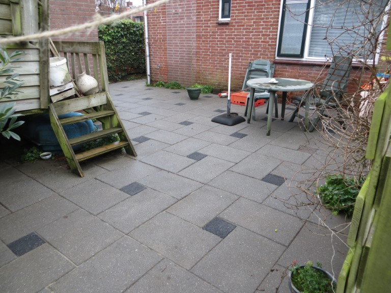 na achtertuin reinigen